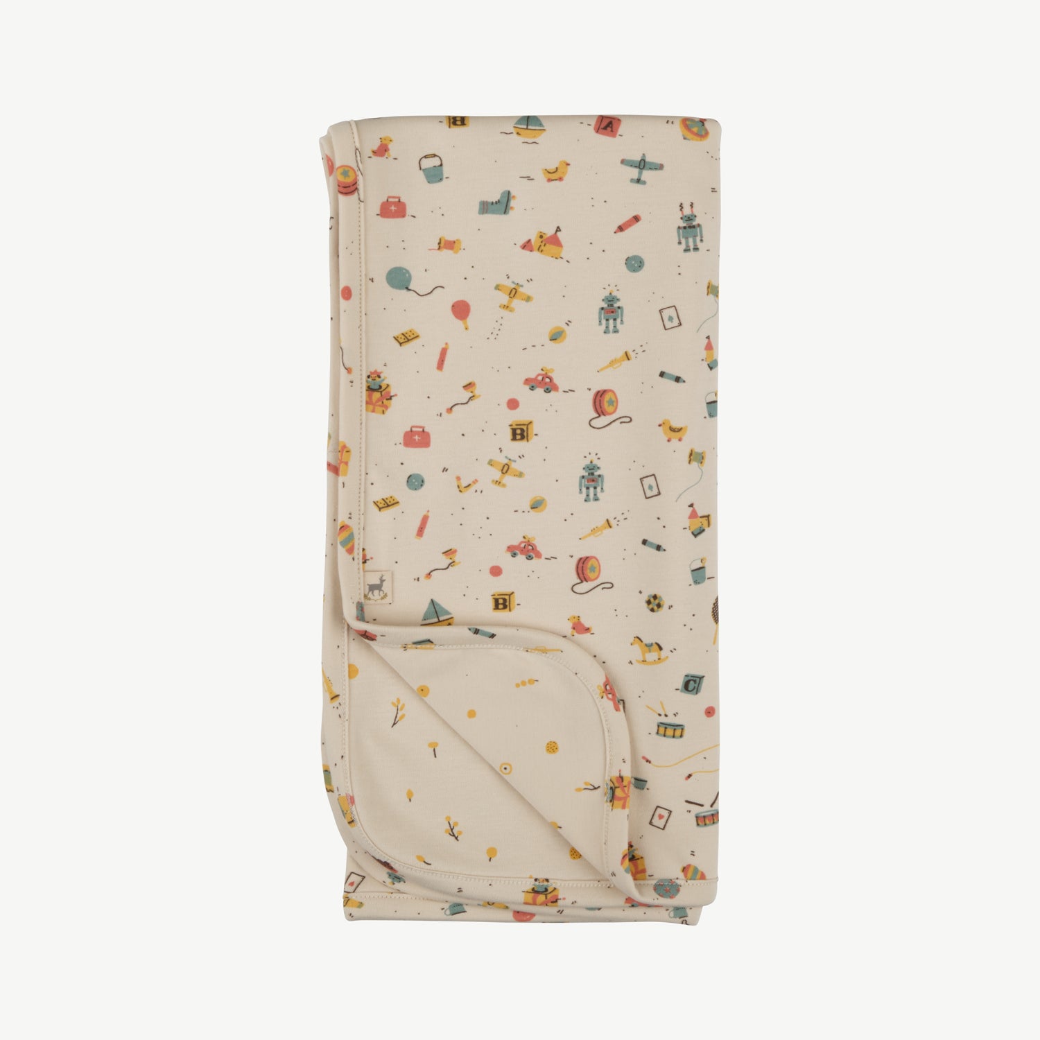 Manta reversible 'bygone toys' tapioca