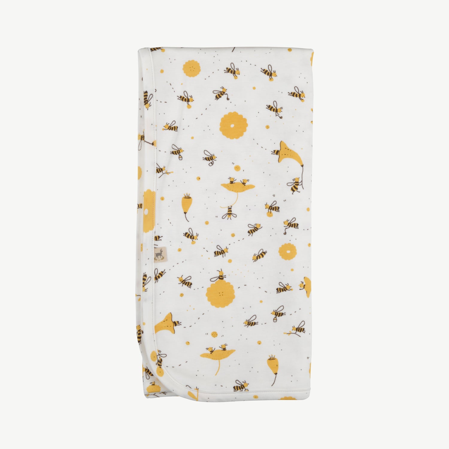 Manta reversible 'buzzy bees' ivory