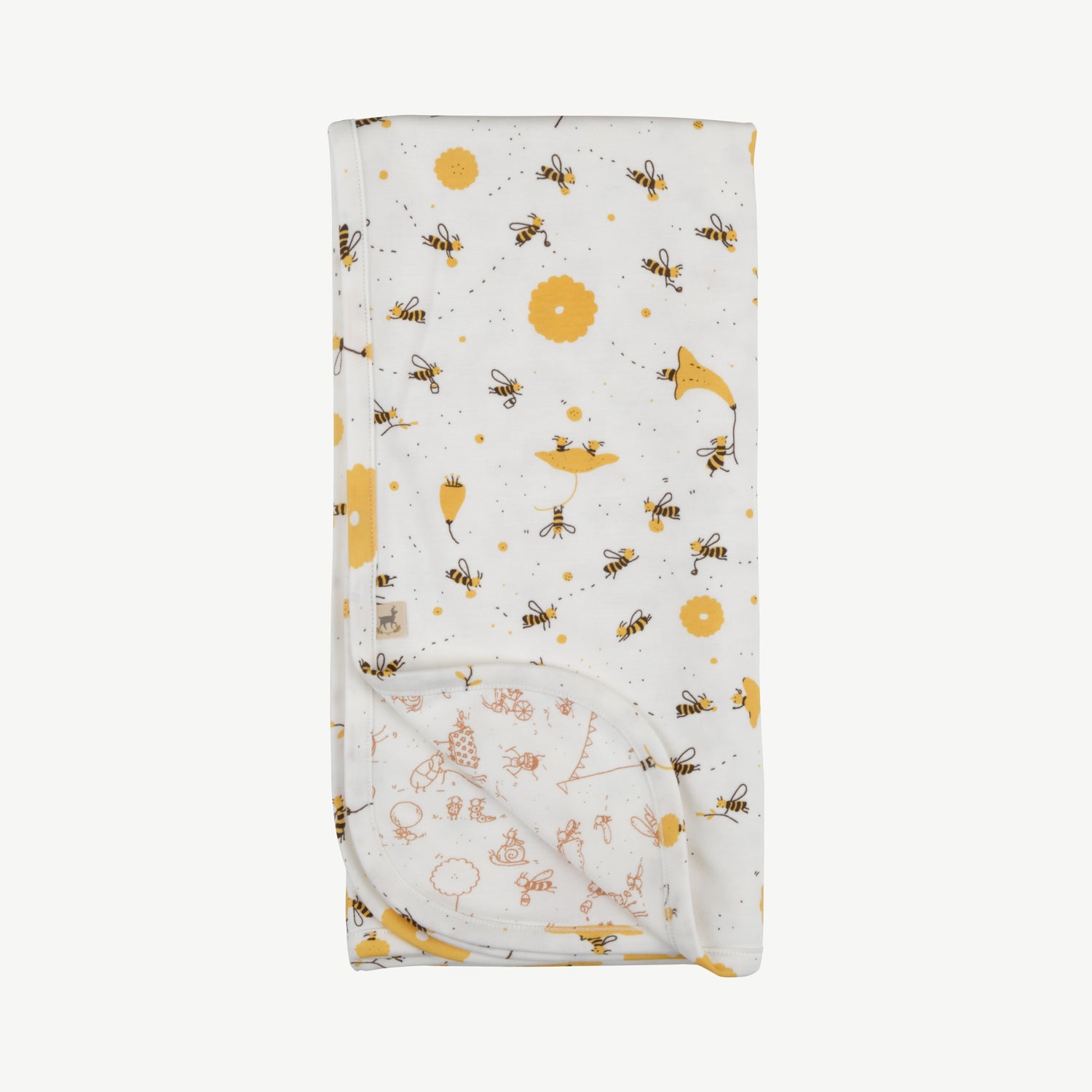 Manta reversible 'buzzy bees' ivory